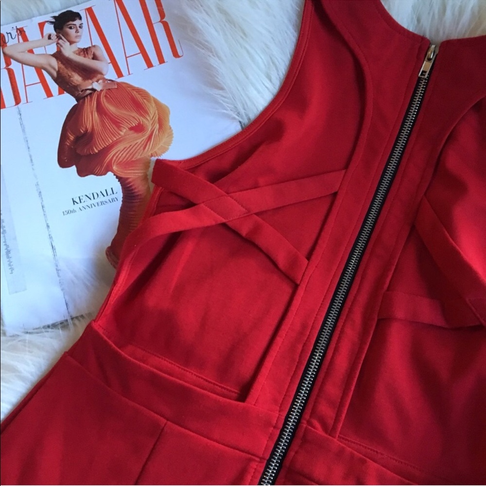 Red strappy body con dress